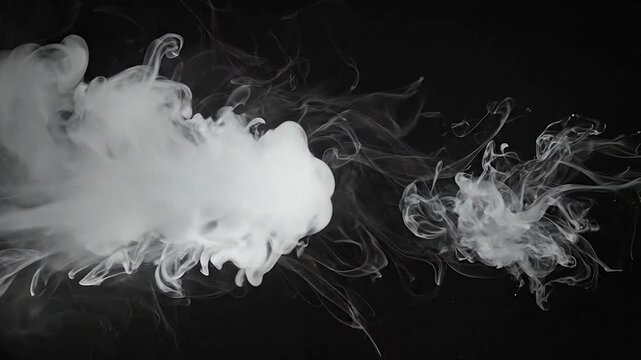 White ink swirling in dark liquid creates abstract flowing patterns