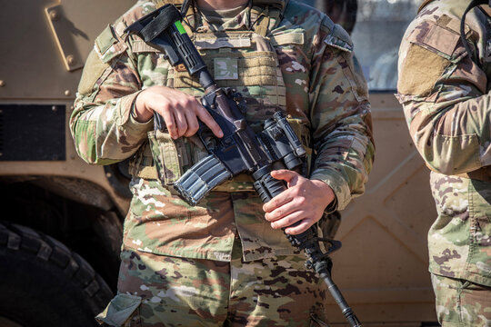 Soldier holds gun in Texas