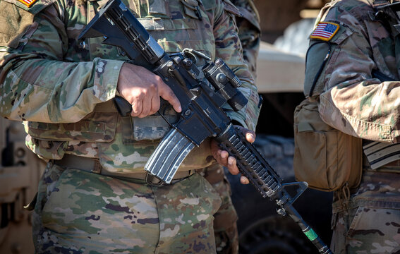 Soldier holds gun in Texas