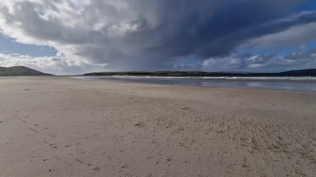 Dramatic clouds at Narin Strand by Portnoo, County Donegal in Ireland.
