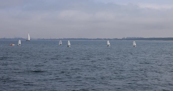 Sopot Poland recreation sailboats Baltic sea. Baltic coast northern Poland. World War II started German invasion. River front business, tourism, hotels and restaurants. Economic international port.