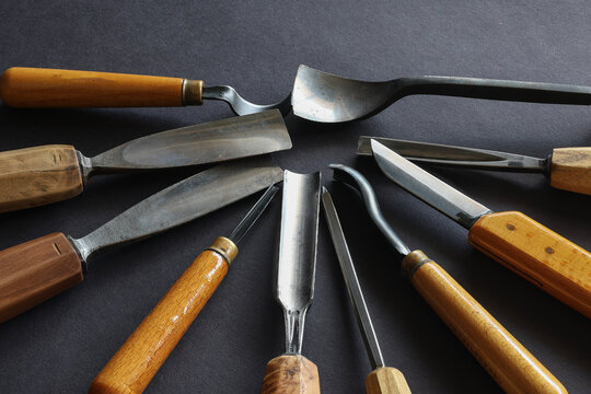 Circular arrangement of professional wood carving tools