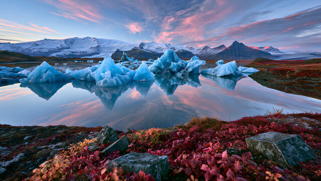 Panoramic Glacial Lagoon with Icebergs and Autumn Tundra Mountains Reflection