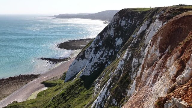 White chalk cliffs at Dover coastline during a bright sunny afternoon