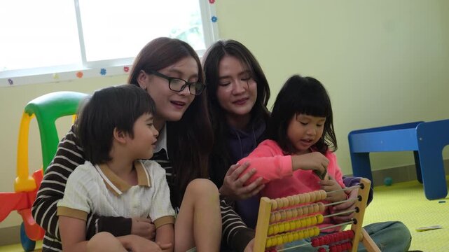The teacher told a story and invited the children to participate in classroom activities.