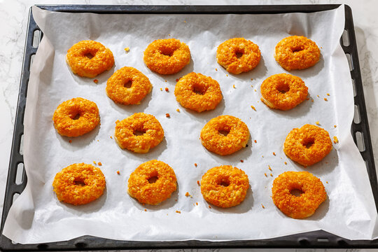 Crispy Mozzarella Party Donuts on a baking tray