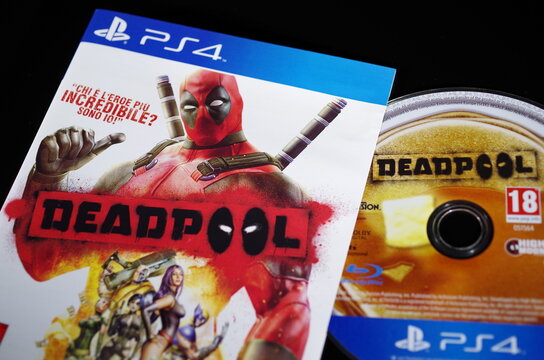 Rome, Italy - June 20, 2026, detail of the cover and Blu-ray Disc of the game Deadpool, the 2013 video game based on the adventures of the Marvel Comics character of the same name, for PlayStation 4.