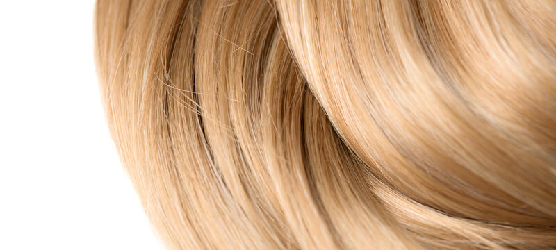 Hair lock isolated on white background, blond hair, healthy and beauty dyed hair border design, salon, treatment, cure, dying concept. Close up, top view 