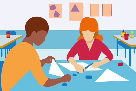 Creative work from home activity with a Black boy and a White girl doing projects at a table in a colorful room