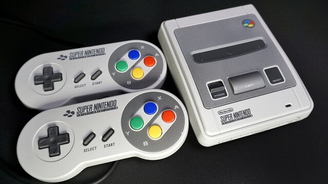 Rome, Italy - June 09, 2022, Super Nintendo Entertainment System (SNES), abbreviated to Super NES or Super Nintendo, a 16-bit video game console, marketed in 1990 in Japan and South Korea.