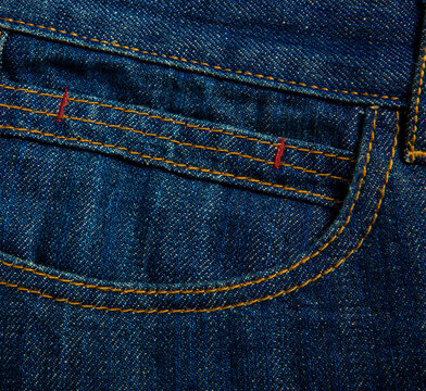 Detailed image of jeans on a white background