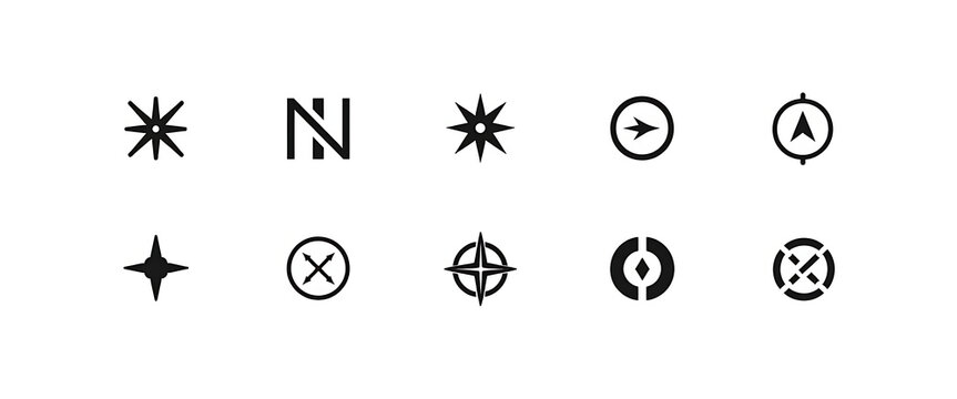 Set of simple black compass and navigation icons for direction finding and travel on white background.