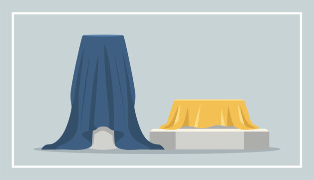 Two mystery objects or surprise sculptures covered with a blue and a yellow silk cloth on gray gallery pedestals.
