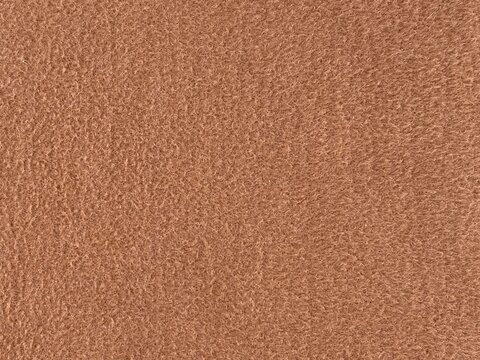 Brown fleece fabric texture background close up