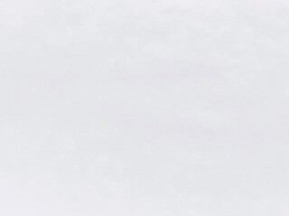 Obraz premium Textured white paper sheet background close up