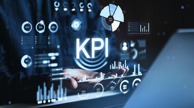 KPI analytics dashboard with futuristic interface and business data visual elements displayed over hands in dark environment scene.