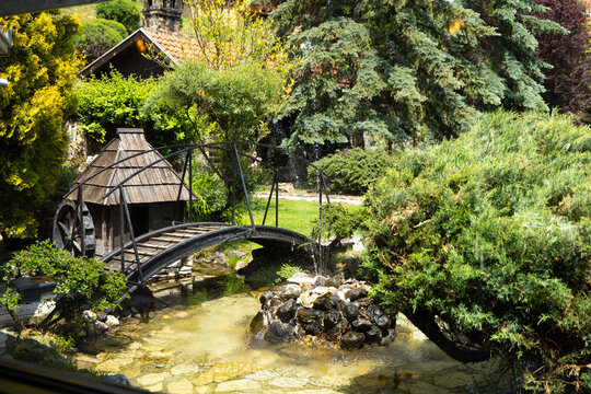 Serbia Mokra Gora 26.05.2026 Rustic Watermill Bridge Over Garden Pond