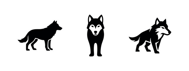 Wolf and husky dog icons set. Black silhouette of wild and domesticated canines symbols. © Lili