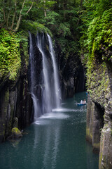 Obraz premium Manai Falls Flowing Down into the Gokase River at Takachiho Gorge, Miyazaki, Japan