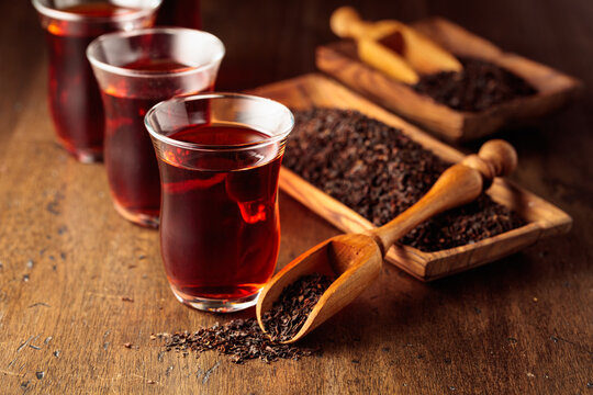 Black tea on an old wooden table.