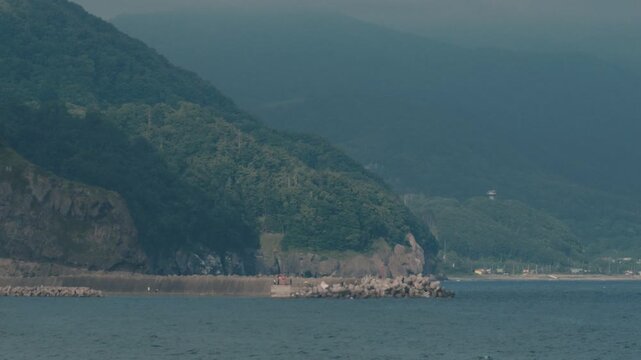 Distant Cityscape Across the Bay Viewed from an Inlet