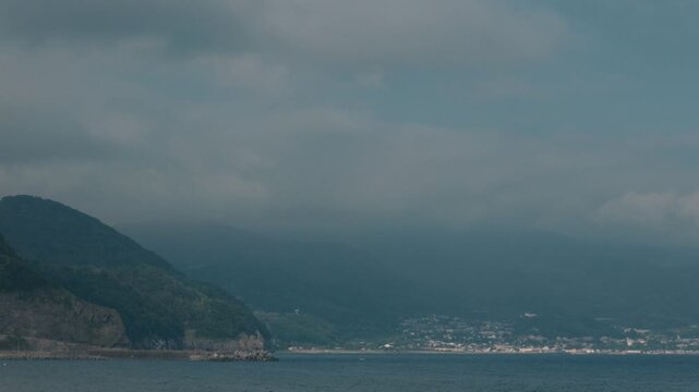 Distant Cityscape Across the Bay Viewed from an Inlet
