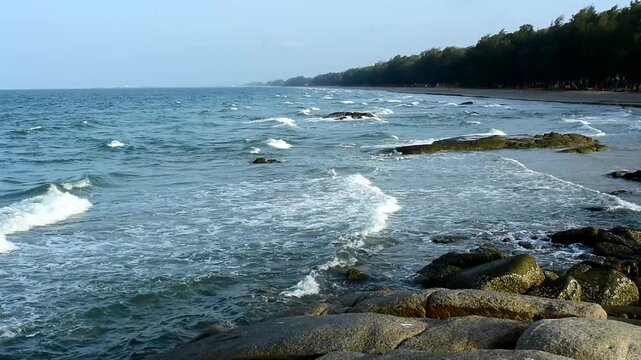 The seaside has sandy beaches and strong waves.