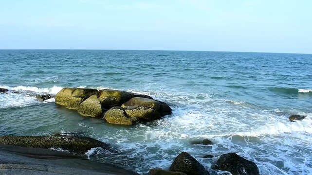 The seaside has sandy beaches and strong waves.