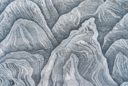 Texture of a natural stone with layer structure as a background