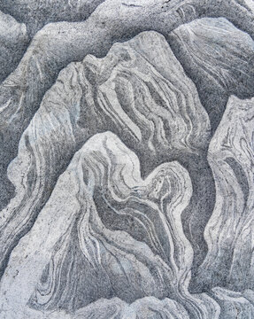 Texture of a natural stone with layer structure as a background
