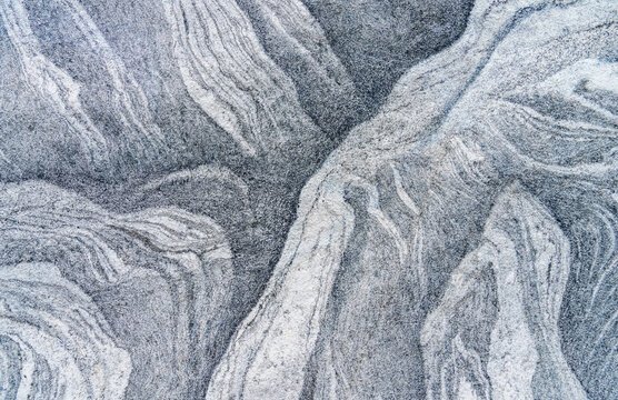 Texture of a natural stone with layer structure as a background