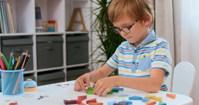 Collage of young boy building with colorful blocks at a table in a bright room