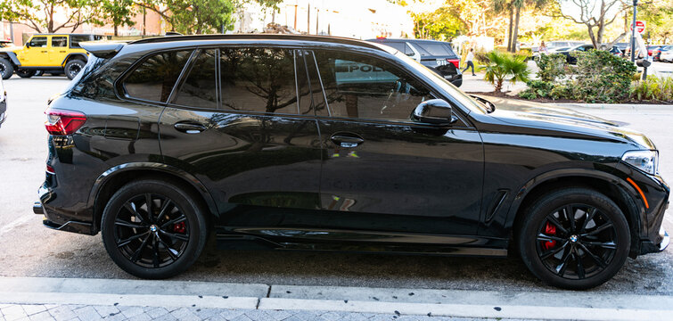 Miami, Florida, USA - July 27, 2025: BMW X5 G05 2019 SUV car. Luxury SUV car BMW X5 G05. Car BMW X5 G05 SUV parked outdoor. Black SUV car, side view