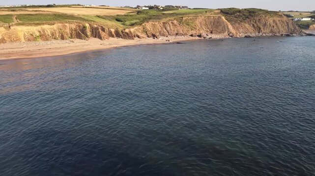 Black Rock drone view over beach at Widemouth Bay Cornwall