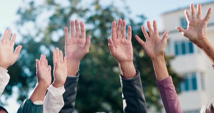 Religion, hands raised and group worship outdoor for morning prayer, spiritual gratitude or faith. Christian community, people and praise together at park for salvation, belief and fellowship support