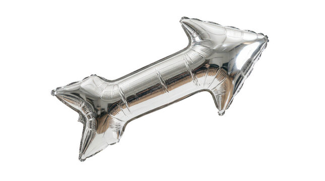 Silver arrow shaped balloon floating diagonally in air isolated on transparent background metallic foil decoration for celebrations.