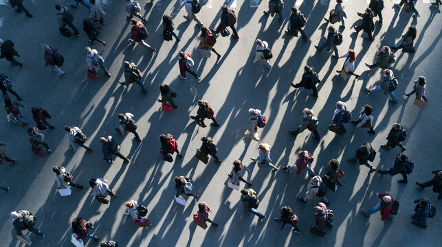 Aerial View of Pedestrians Crossing Urban Street