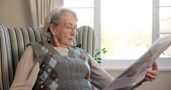 Glasses, newspaper and retirement with old woman in living room of home for break or information. Article, reading and relax with senior person on chair in apartment for media publication or report