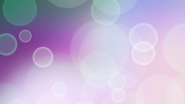Abstract dreamy bokeh background with circles in shades of purple pink and green creating a soft blurred effect for design overlays