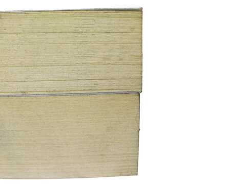Close-up of stacked old book pages edge isolated on transparent background