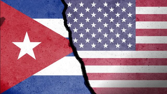 Flag of USA and Cuba painted on a concrete wall with airplane shadows