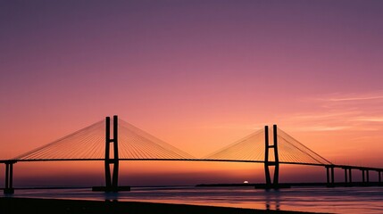 Obraz premium Suspension bridge sunset silhouette orange purple