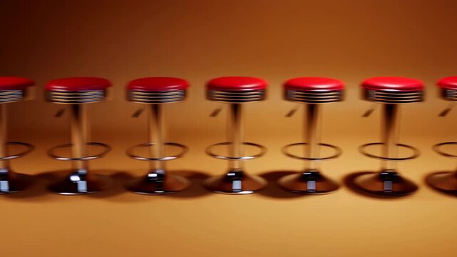 Row of chrome bar stools with glossy red round seats arranged in even spacing across warm tan gradient background with soft blur, polished reflections, and subtle depth change