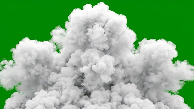 Thick white smoke billowing upwards against a bright green screen background for visual effects compositing