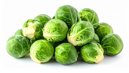 Fototapeta premium A heap of fresh green Brussels sprouts on white background, culinary ingredients, vegetable variety.