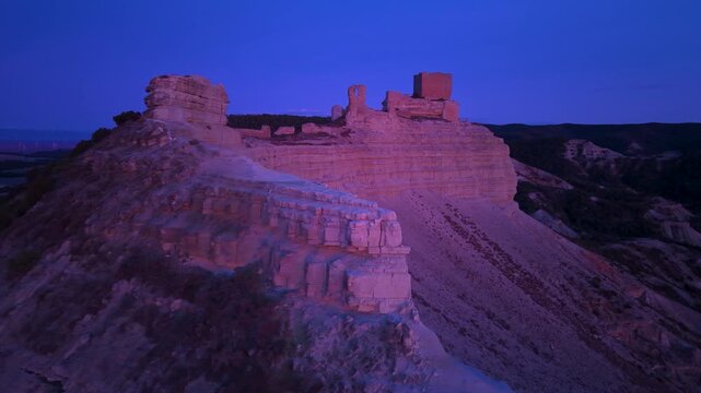 Aerial view from a drone of Sora Castle, ruins of a medieval fortress on the top of a rocky hill near the village of Castej&oacute;n de Valdejasa, Cinco Villas region, province of Zaragoza, Aragon, Spain, Eu