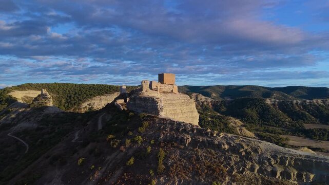 Aerial view from a drone of Sora Castle, ruins of a medieval fortress on the top of a rocky hill near the village of Castej&oacute;n de Valdejasa, Cinco Villas region, province of Zaragoza, Aragon, Spain, Eu