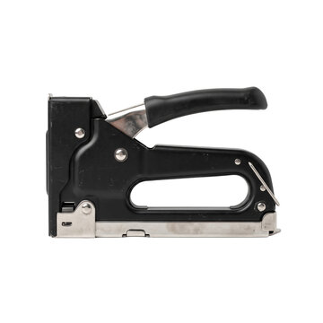 Industrial black metal heavy duty staple gun on transparent background