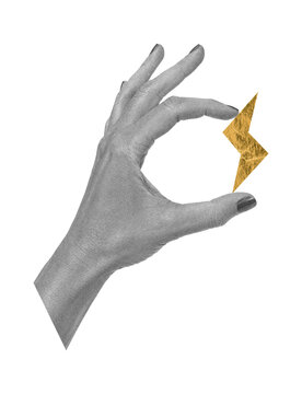 Surreal scrapbook art collage with human hand holding a golden foil lightning bolt on transparent background. Energy, power, creativity and bold ideas