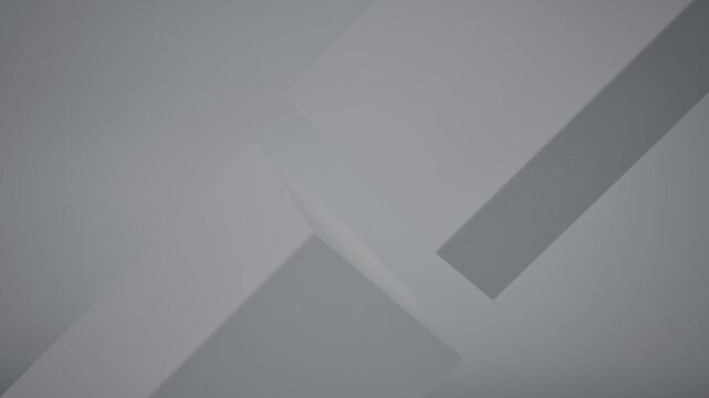 CGI of grey diagonal shapes on gradient background. Minimal light and shadow creates an elegant motion background for corporate presentations. Rendered in Unreal Engine.